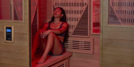 woman sitting in sauna