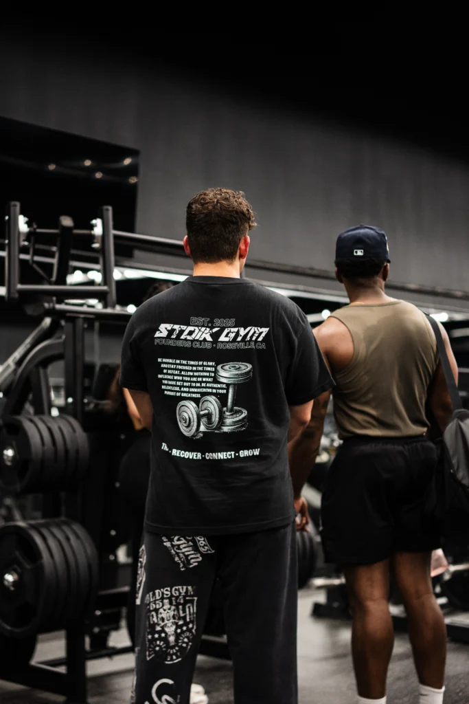 man wears a Stoik Gym t-shirt