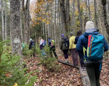 a group of young hikers in Acadia National Park