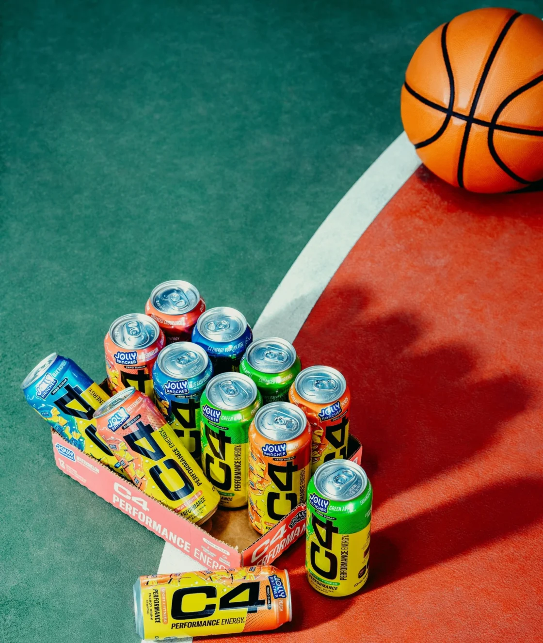 C4 energy drinks next to a basketball