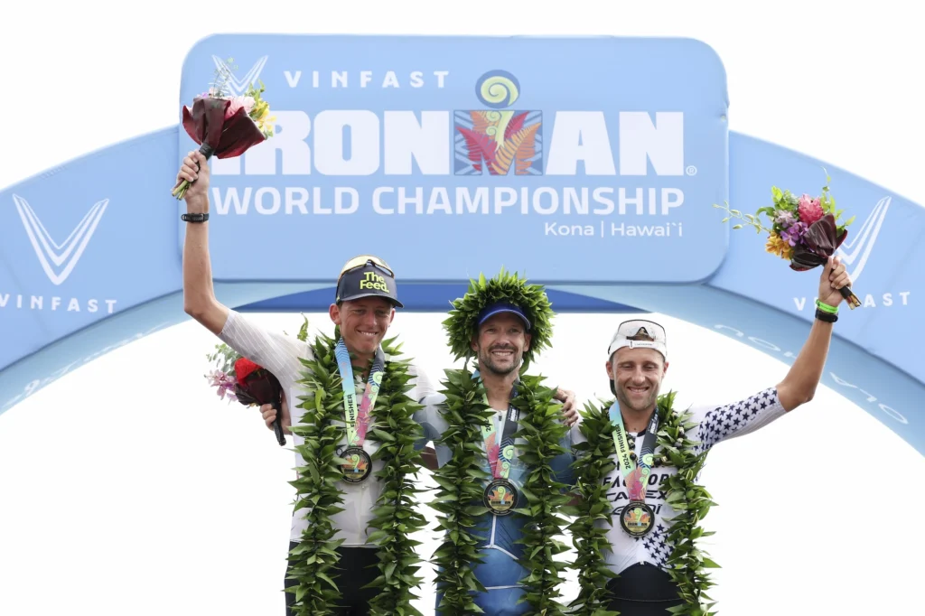 men wear lei necklaces after finishing a triathlon in Hawaii 