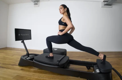 Dua Lipa on a Frame Fitness Pilates reformer