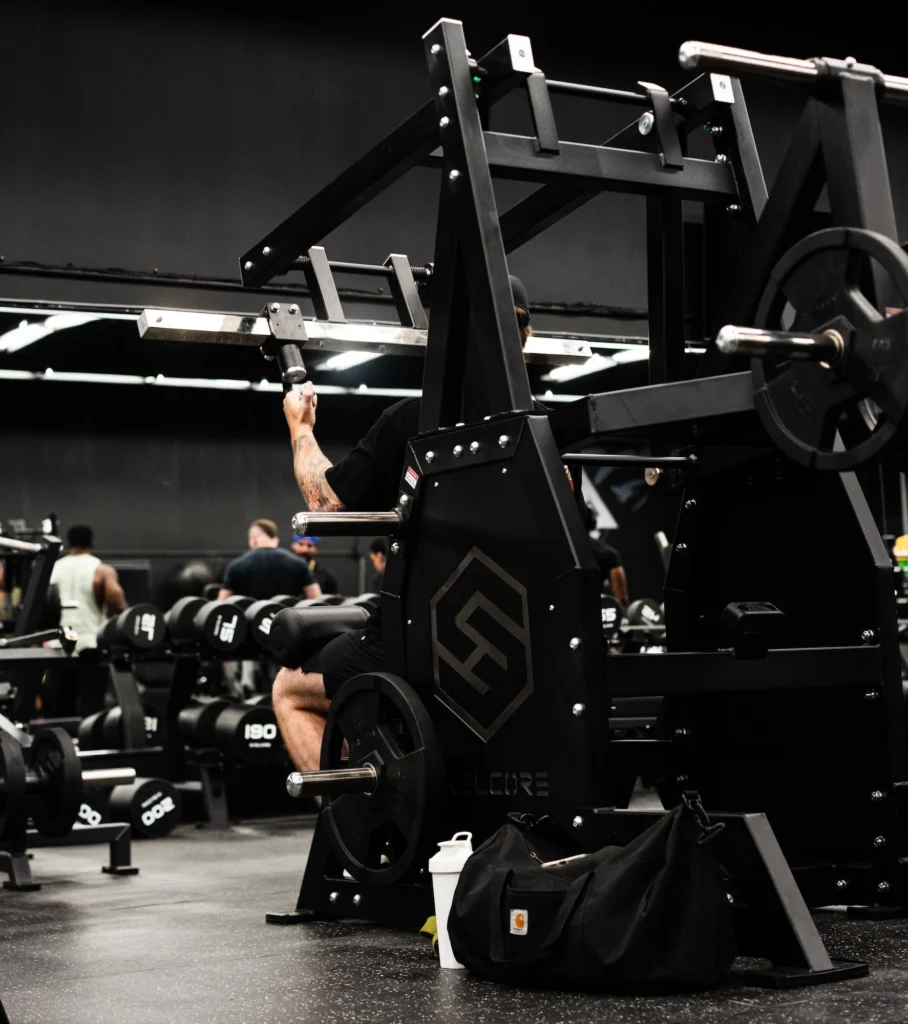 man uses a Skelcore lat pulldown machine