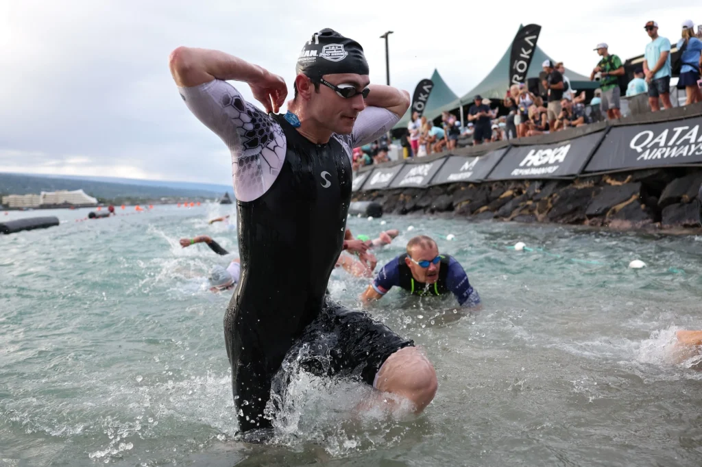 man competes at Ironman triathlon